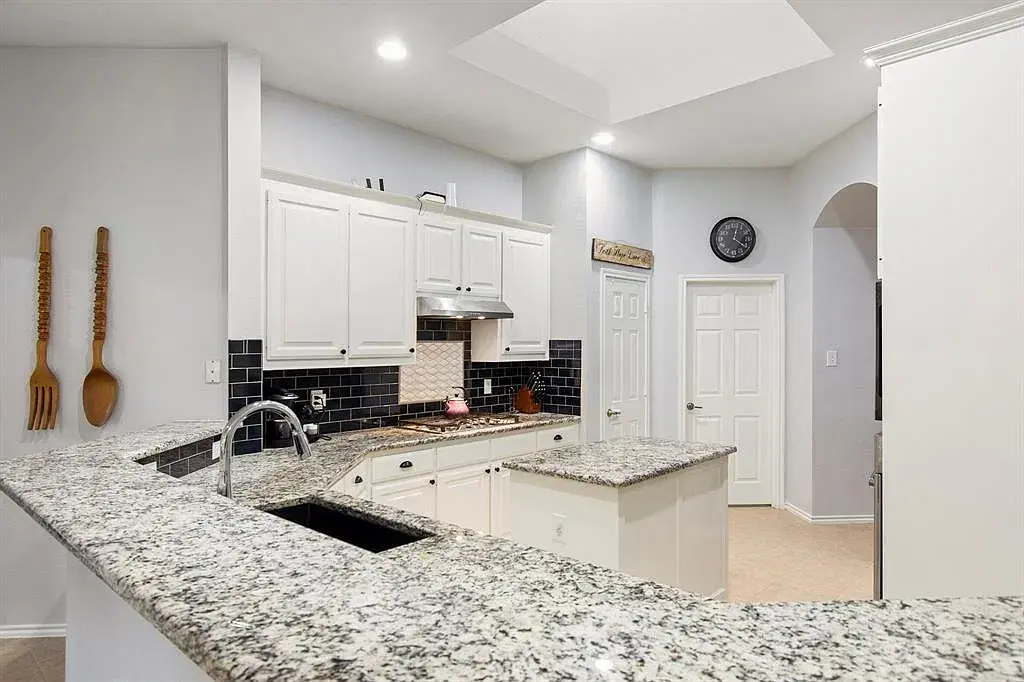 Kitchen sink and granite countertops